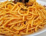 A picture of step 7 of Fried Baby Snails On Mixed Veggies Jollof Pasta.