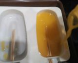 A picture of step 3 of Orange Ice lolly.