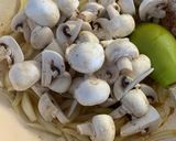 A picture of step 5 of Pork Medallions in a Mushroom and Sherry creamy sauce.