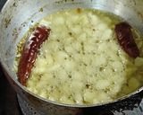 A picture of step 2 of Dahi Tadka.
