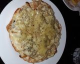 Foto del paso 3 de la receta: Fugazzeta con lo que hay 🤭
