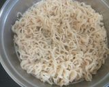 A picture of step 2 of Veg Chinese Masala Noodles.