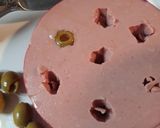 A picture of step 2 of Olive Loaf Luncheon Meat.