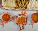 Hình bước làm 5 của món Lẩu đầu cá hồi nấu măng chua