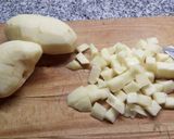 Foto del paso 1 de la receta: Puré de papas dos quesos con jamón y verdeo
