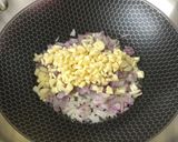 A picture of step 2 of Garlic Turmeric Rice.