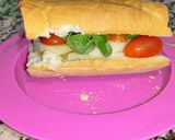 Foto del paso 3 de la receta: Bocadillo de queso curado con canónigos y tomates cherry 😋