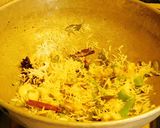 A picture of step 4 of Coconut Pulao (coconut pilaf).