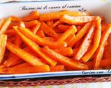 Foto del paso 5 de la receta: Palitos de zanahorias al comino