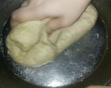 A picture of step 8 of Ashtami special prasaad the puri chana and halwa thali.