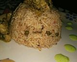 A picture of step 8 of Soya Chaap Biryani with green chutney.
