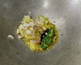 A picture of step 3 of Pumpkin Saag(kumro) with Moong dal and Coconut.