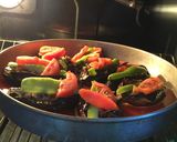 A picture of step 11 of Karniyarik (Stuffed eggplant).