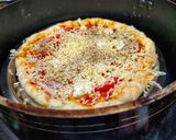 A picture of step 3 of Paneer and onion pizza.