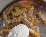 A picture of step 3 of Masala corn fries.