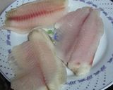 A picture of step 1 of Marinated fish fillet steak with royco broth.