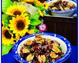 A picture of step 2 of Mediterranean beet salad with dash of roasted walnuts.