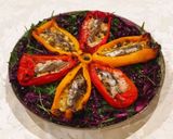 Foto del passaggio 5 della ricetta Peperoni gratinati cavolo cappuccio e rucola