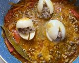 A picture of step 6 of Masala Egg Bejo.