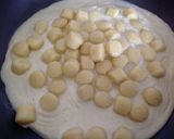 Foto del passaggio 7 della ricetta Gnocchi con ragù bianco di tastasale e pioppini, con crema di porro