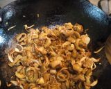 A picture of step 2 of Chana dal karela.