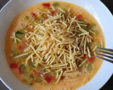 Foto del paso 3 de la receta: Tortilla paisana con tacos de jamón y patatas paja