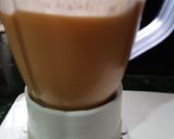 A picture of step 3 of Mango smoothie with lemon.