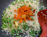 Foto del paso 4 de la receta: Arroz improvisado de salchichas y morcilla
