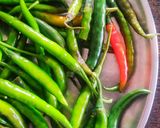 A picture of step 1 of Instant Green Chilli Pickle.
