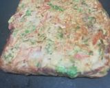 A picture of step 4 of Besan bread on griddle.