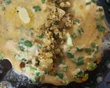 A picture of step 4 of Green onion moong dal chilla.