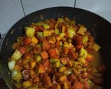 A picture of step 14 of Gajar Aloo Matar.