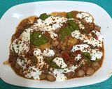 A picture of step 4 of Kashi Chat Bhandar's Chole Tikki Chat.