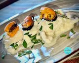 Foto del paso 7 de la receta: Rosada en salsa de cebolla y mejillones