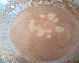 A picture of step 2 of Soya halwa.