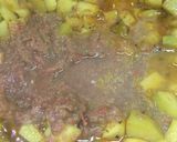 A picture of step 2 of Spicy achari alu.