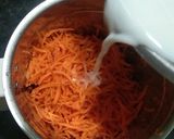 A picture of step 1 of Gajar barfi (carrot pak in pressure cooker).