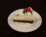 A picture of step 22 of White Chocolate Mousse Cheesecake with a Fudge Brownie Crust.