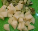 صورة لخطوة 4 من وصفة سلطة فواكة بالعصير🍸 🍏🍊🍎🍇