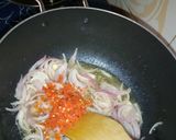 A picture of step 2 of Carrot rice.