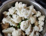 A picture of step 2 of Cauliflower and raw banana sabzi.
