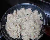 Foto del paso 4 de la receta: Pimientos del piquillo rellenos de merluza y palitos de cangrejo
