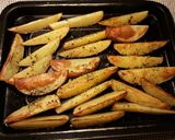 Foto del paso 11 de la receta Pollo al ajillo y romero al horno con patatas asadas