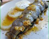Foto del paso 13 de la receta: Merluza rellena de espinacas con langostinos y pasas