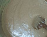 A picture of step 5 of Chocolate Guinness cake with whipped cream icing.