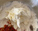 A picture of step 6 of Badam ne Chokhana lotna phiniya ladoo(Almond and rice flour whipped ladoo).