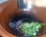 A picture of step 4 of Brinjal Curry in white gravy.