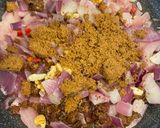 A picture of step 2 of Red onion chutney with nuts and raisins.