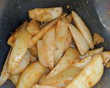 A picture of step 5 of Spicy potato wedges.