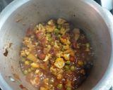 A picture of step 2 of Cauliflower with green peas and carrot potato.